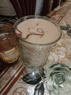 A picture of Banana shake with date and chocolate spread 🍸🍸🍸.