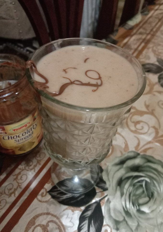 A picture of Banana shake with date and chocolate spread 🍸🍸🍸.