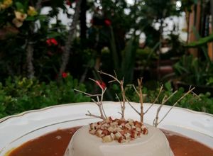 Una foto de 🌰Pannacota de crema de almendra con dulce de leche🌰