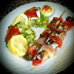 A picture of Sardine skewers.
