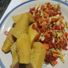 A picture of Boiled plantain with vegetable sauce.