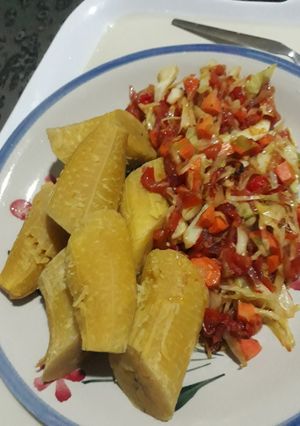 A picture of Boiled plantain with vegetable sauce.