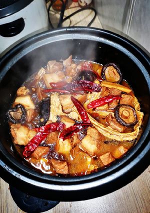 A picture of Braised Pork Belly with dried mushrooms and dried tofu skin.