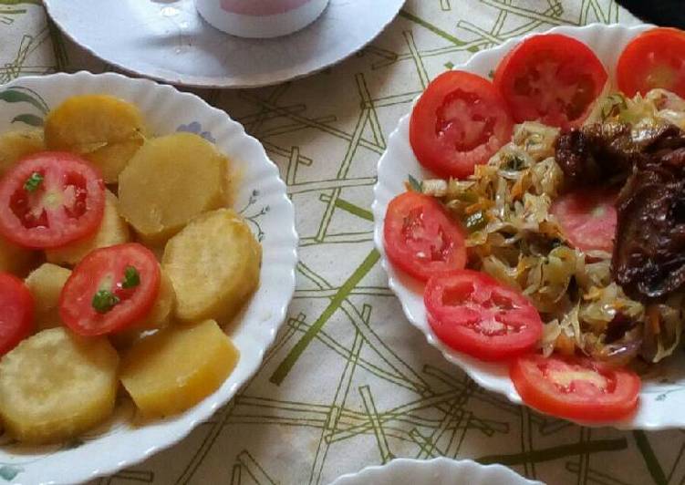 Sweet potatoes served with chicken and cabbage