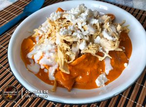 Una foto de Chilaquiles en crema de Chipotle