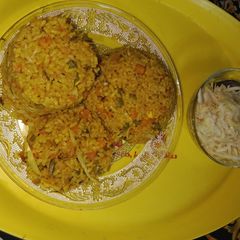 A picture of Fried Rice and Salad.