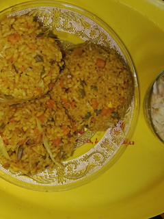 A picture of Fried Rice and Salad.