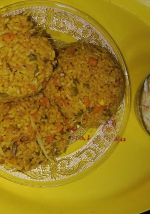 A picture of Fried Rice and Salad.