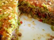 Una foto de gratinar con queso de cabra