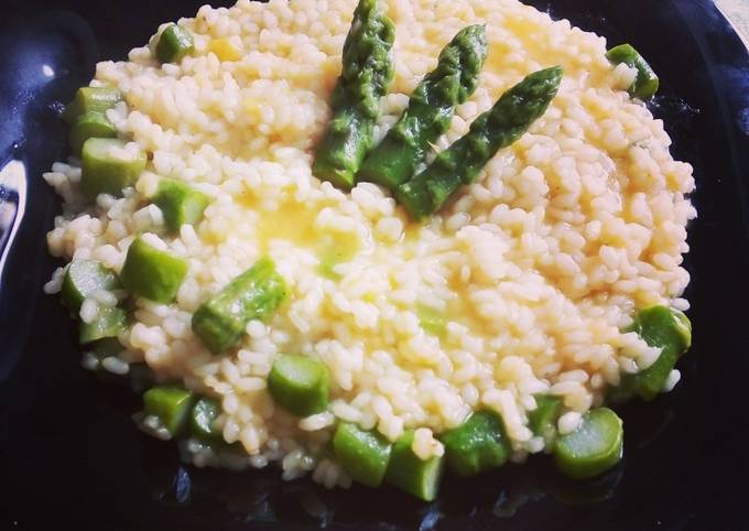 Ricetta di Premiato Risotto crema di zucca e asparagi