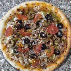 Capsicum black Olive cheese pizza A picture of Capsicum black Olive cheese pizza.