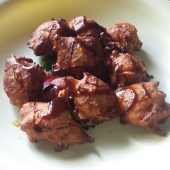 A picture of Banana pakoda with honey and chocolate syrup.