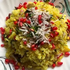 Aloo poha with pomegranate A picture of Aloo poha with pomegranate.