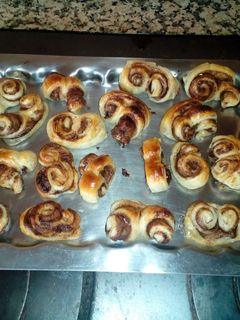 Una foto de Mini palmeras de hojaldre y Nocilla