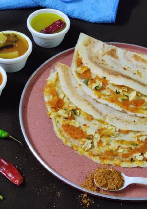 A picture of Papad masala stuffed moong dal chilla.