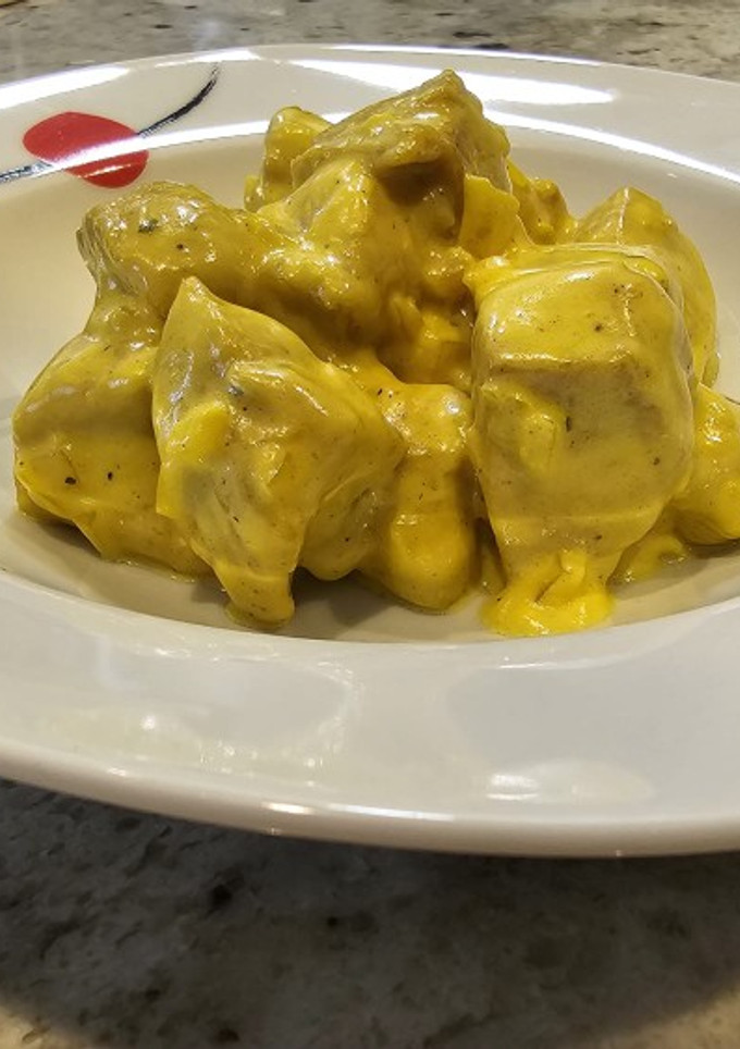 Una foto de Pollo adobado en salsa de cebolla y mostaza