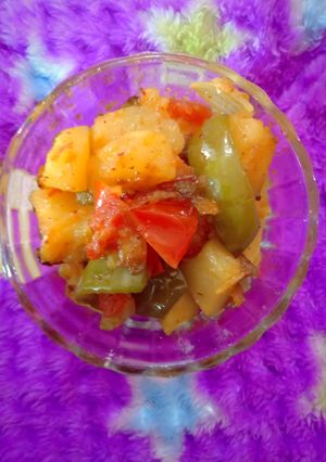 A picture of Potato and capsicum veg.