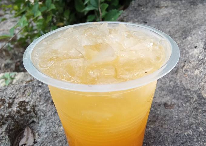 Bagaimana Menyiapkan Es sari jeruk peras yang Lezat