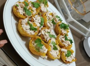 Una foto de Canasta de plátano, rellena de pollo a la crema