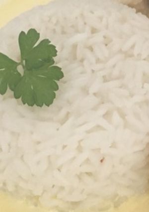 Una foto de Receta de arroz, común pero con tips para que no se pegue!