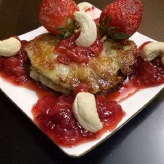 A picture of Bread malpua with strawberry sauce.