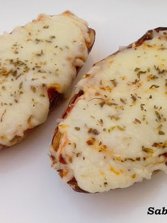 Una foto de Berenjenas con queso