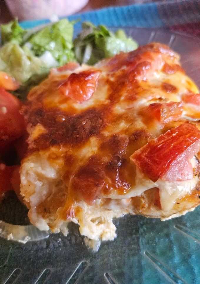Una foto de Pollo al horno con papas y muzzarella