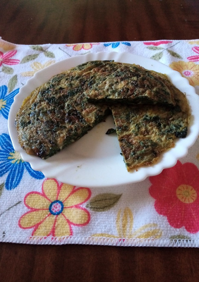 Una foto de Tortilla de espinacas con cebolla