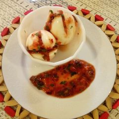 A picture of #localfoodcontest_Kisumu Boiled Eggs with kachumbari.