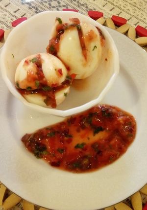 A picture of #localfoodcontest_Kisumu Boiled Eggs with kachumbari.