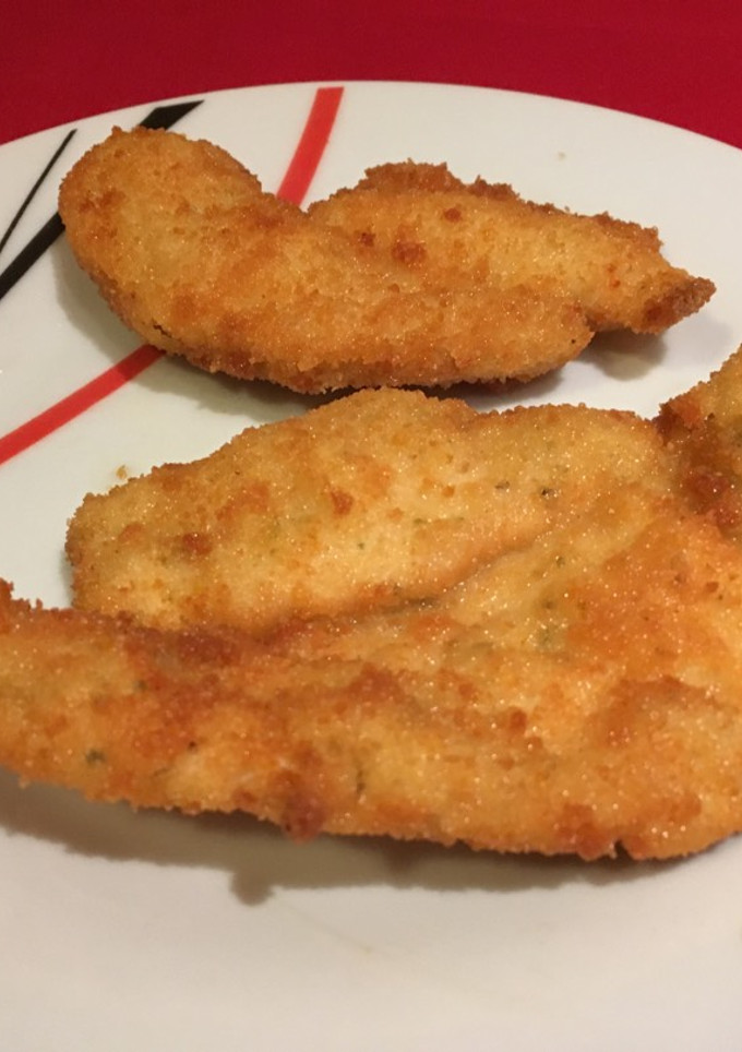 Una foto de Pechuga al curry empanada