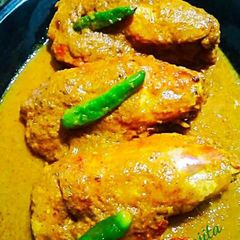 A picture of (Prawn Malai curry) Prawn in a thick coconut Gravy.