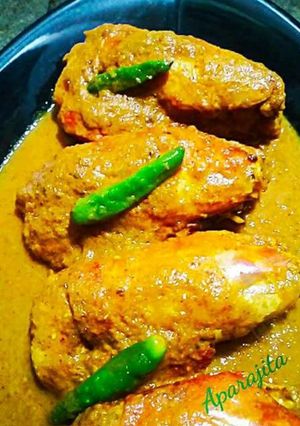 A picture of (Prawn Malai curry) Prawn in a thick coconut Gravy.