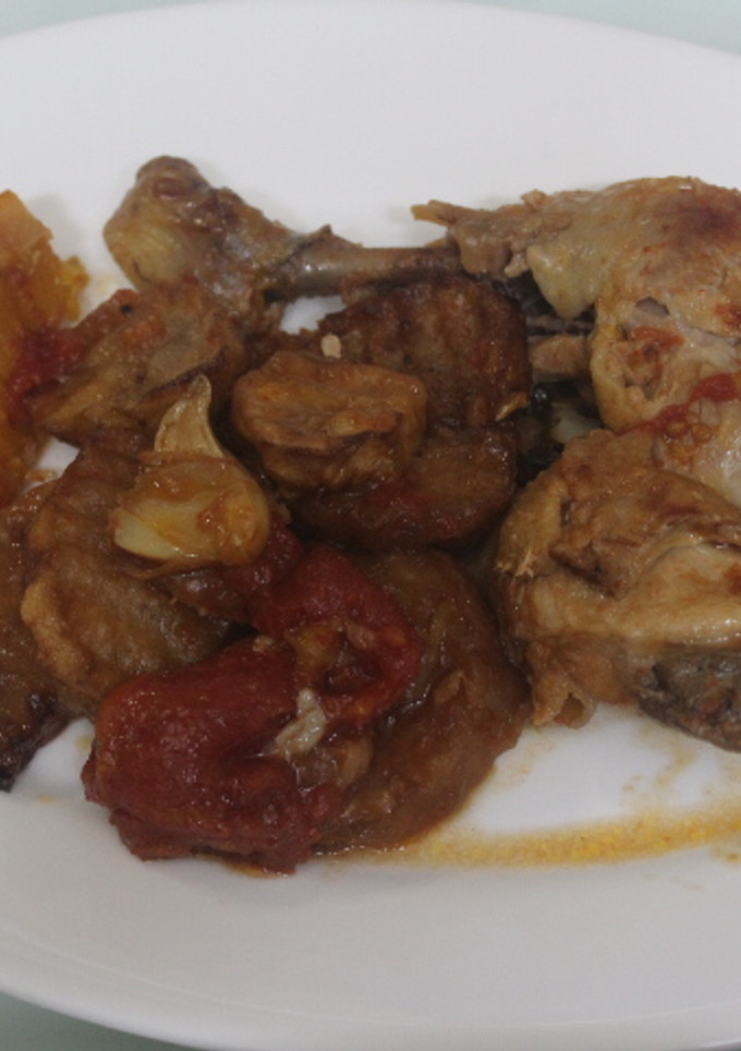 Una foto de Pollo a la naranja con sobras de patatas
