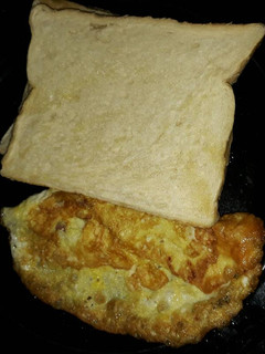 A picture of Fried eggs and sliced bread.