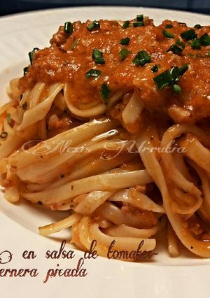 Foto principal de Tallarines, en salsa de tomates peras y ternera picada