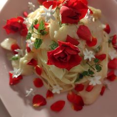 A picture of Cold peach pasta with red rose sauce….