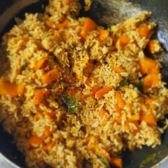 A picture of Yellow Capsicum Tamarind Rice.