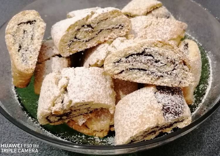 Step-by-Step Guide to Prepare Fatto in casa super veloce Rollini di frolla al cacao e mandorle😍