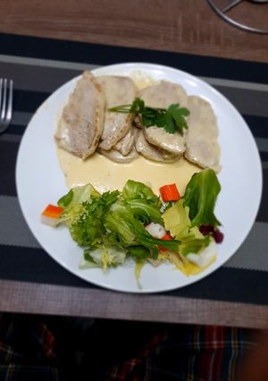 Una foto de Lomos de cerdo con salsa pimienta