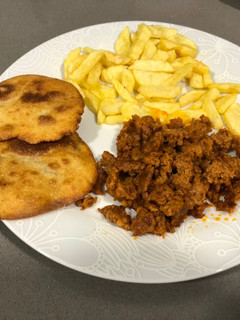 Una foto de Tortos de maíz con picadillo