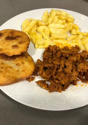 Una foto de Tortos de maíz con picadillo