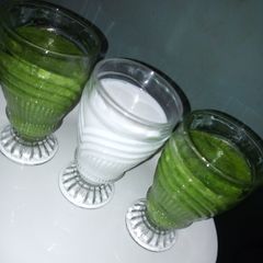 A picture of Green healthy smoothy and coconut banana smoothy.