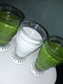 A picture of Green healthy smoothy and coconut banana smoothy.