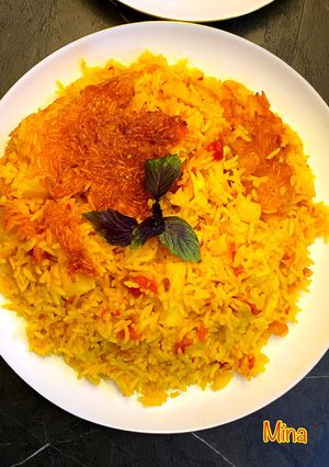 عکسی از دستور گوجه پلو جنوبی (شله تُماته‌ای)