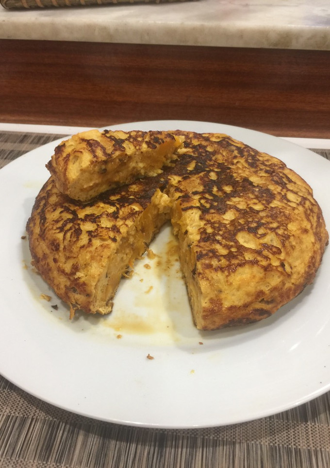 Una foto de Tortilla de calabaza al toque de queso curado