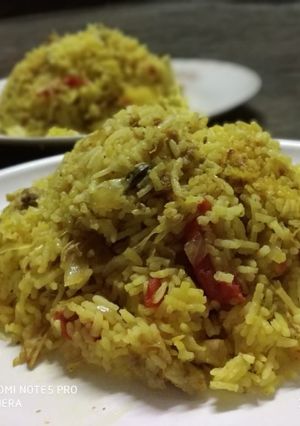 A picture of Chicken fried rice.