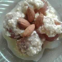 A picture of Baked jaggery gulab jamun with rabdi.