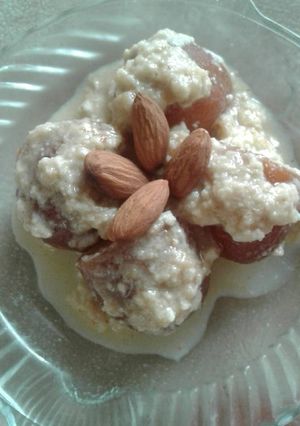 A picture of Baked jaggery gulab jamun with rabdi.