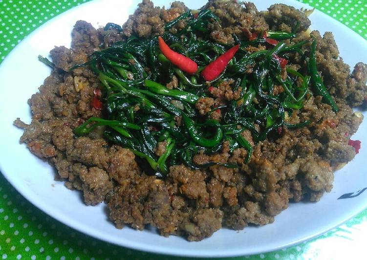 Tumis oncom kangkung